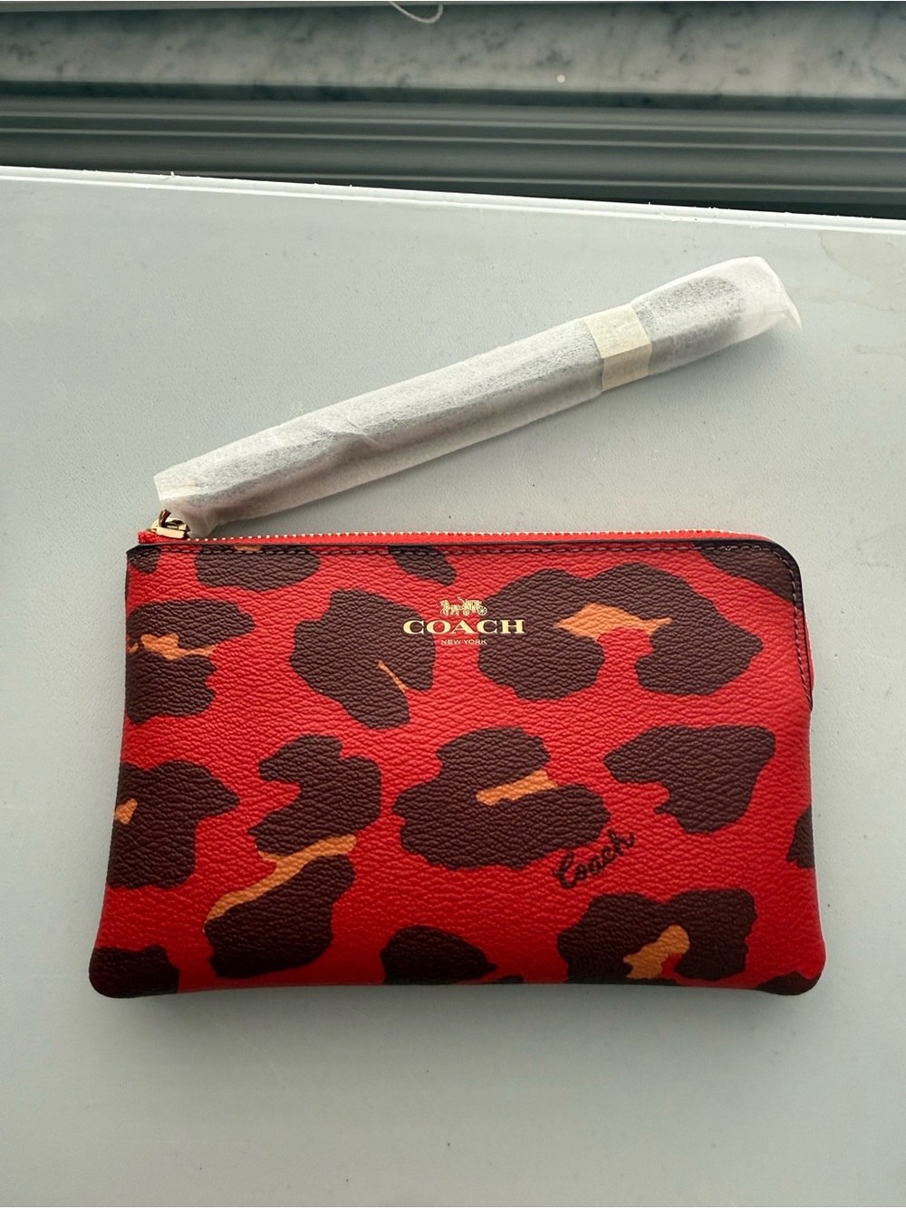 Coach Red Leopard Print Leather Zip Wristlet with Gold Logo